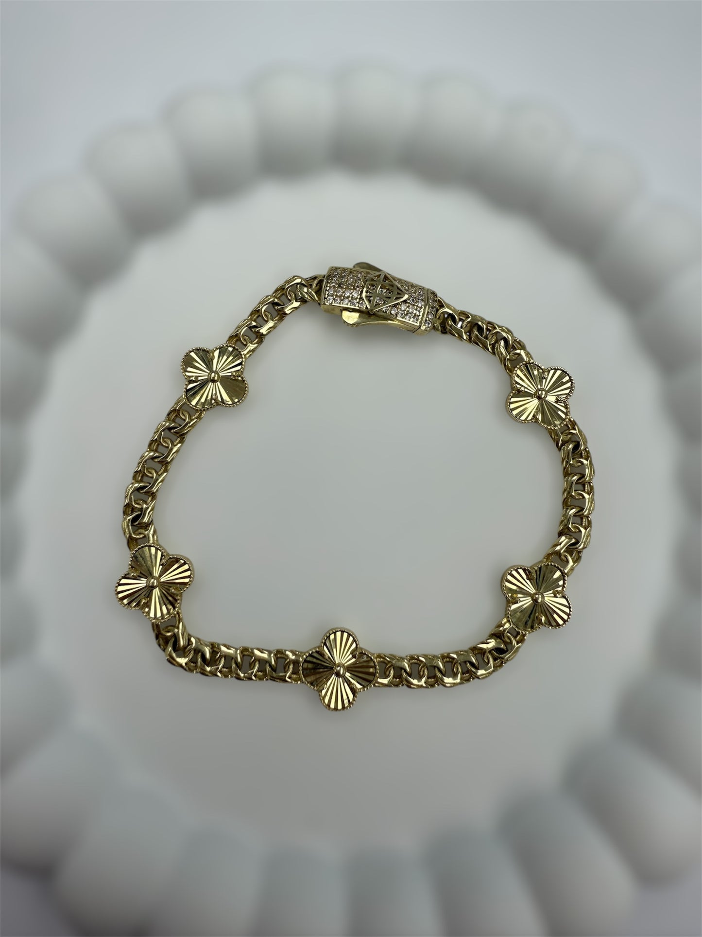 Pulsera Mónaco de 5 flores 10K