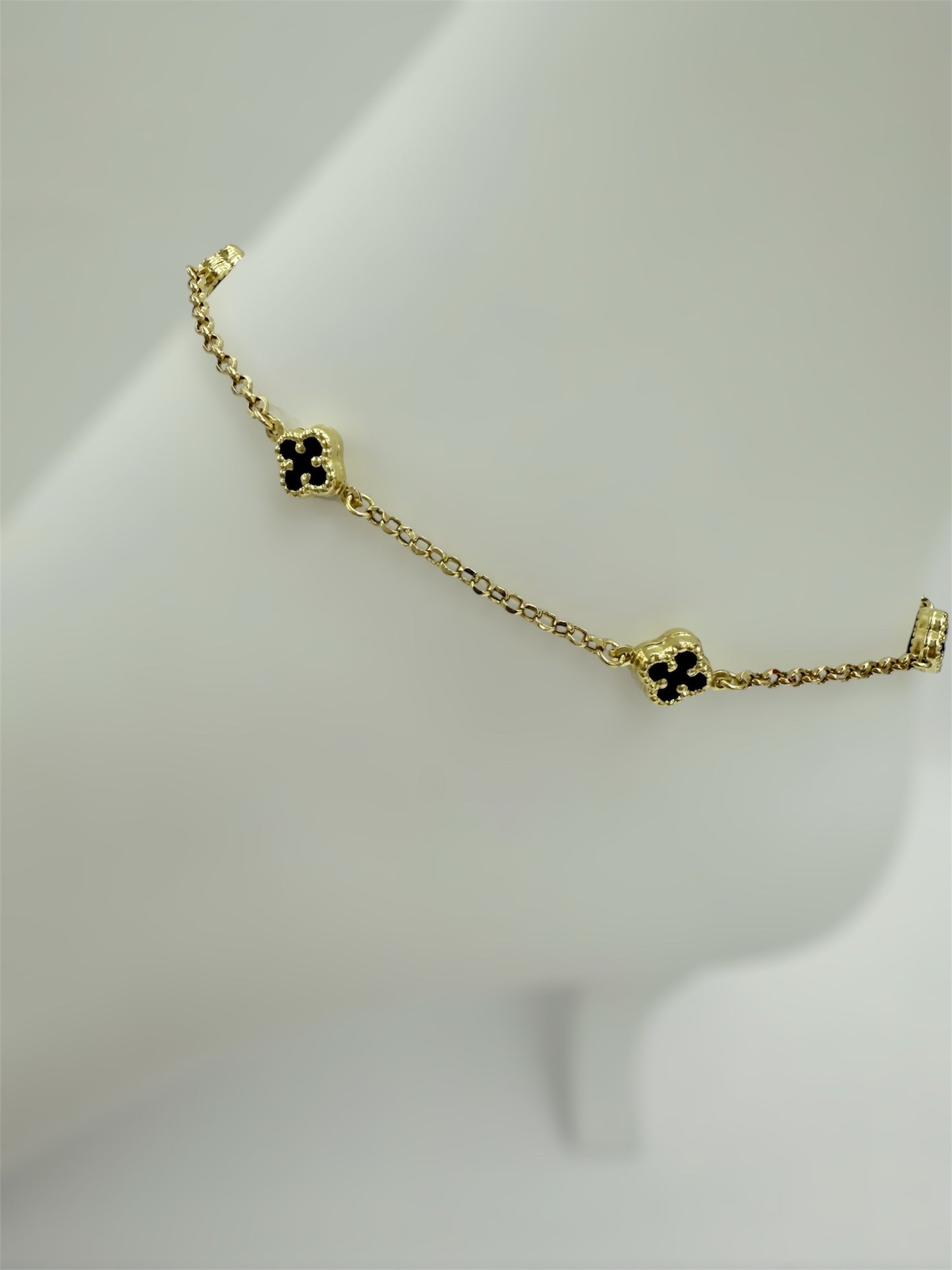 Tobillera de clover negro 14K