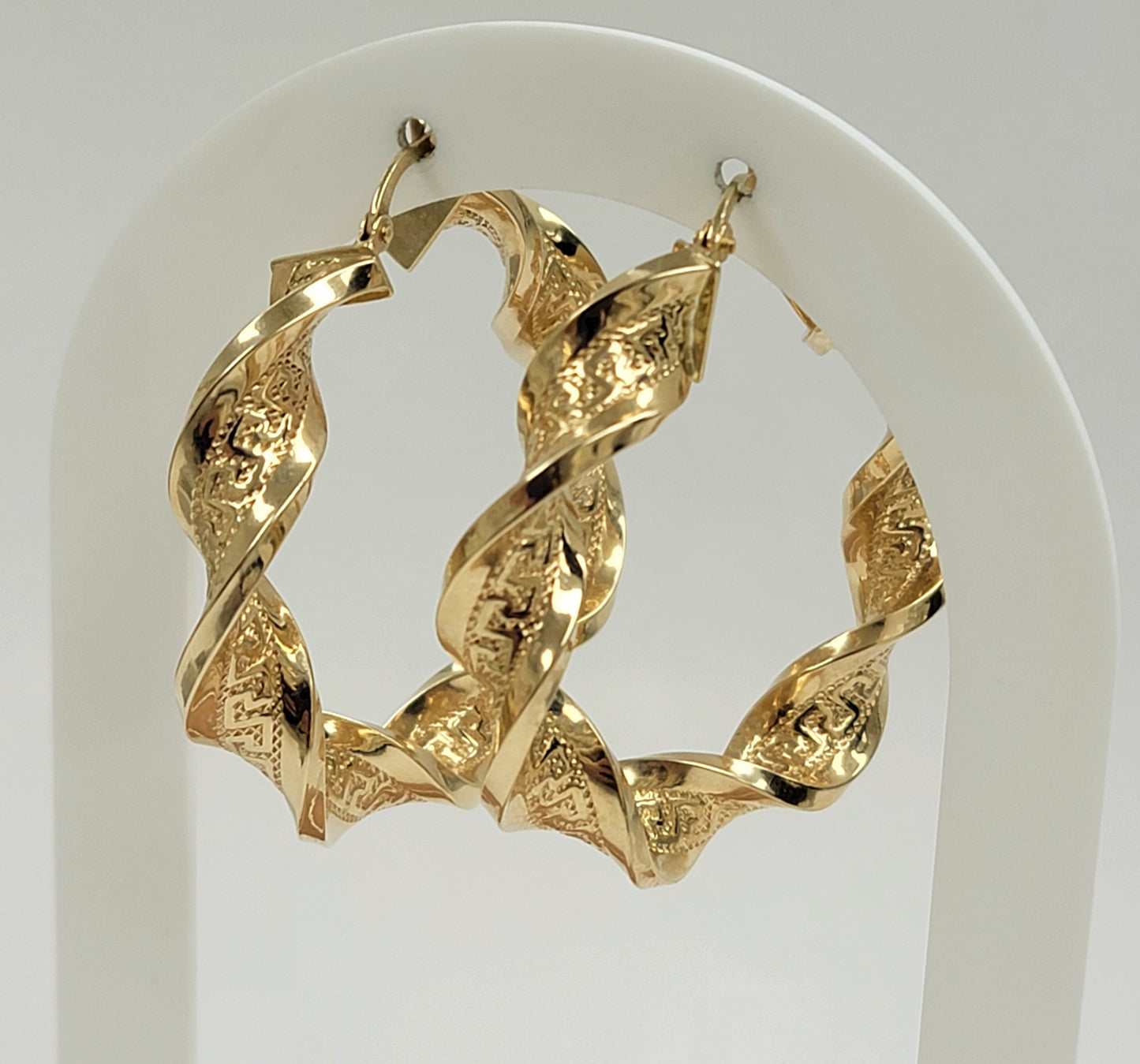 Argollas torcidas versa 14k