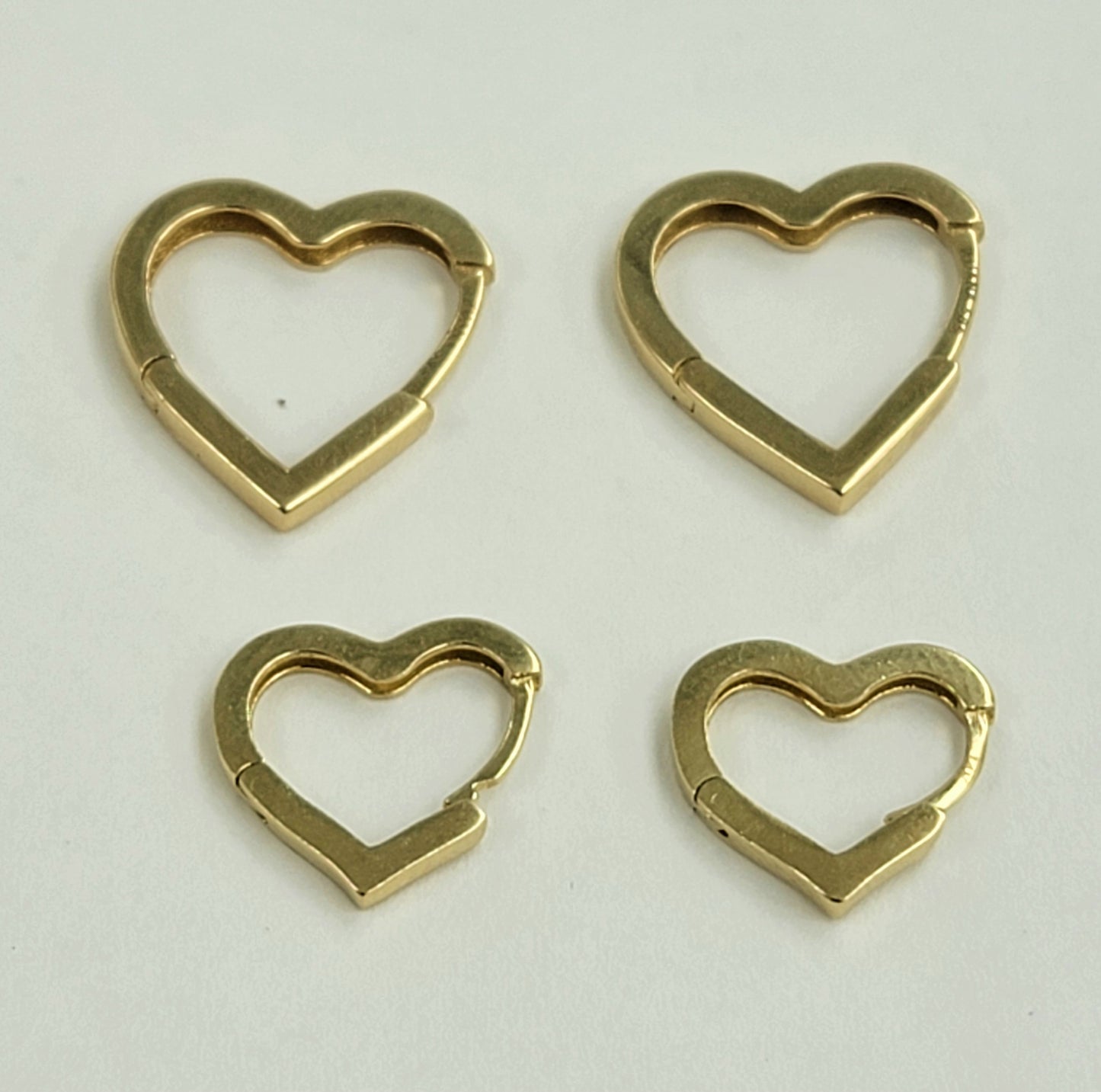 Argollas en forma corazon 14K