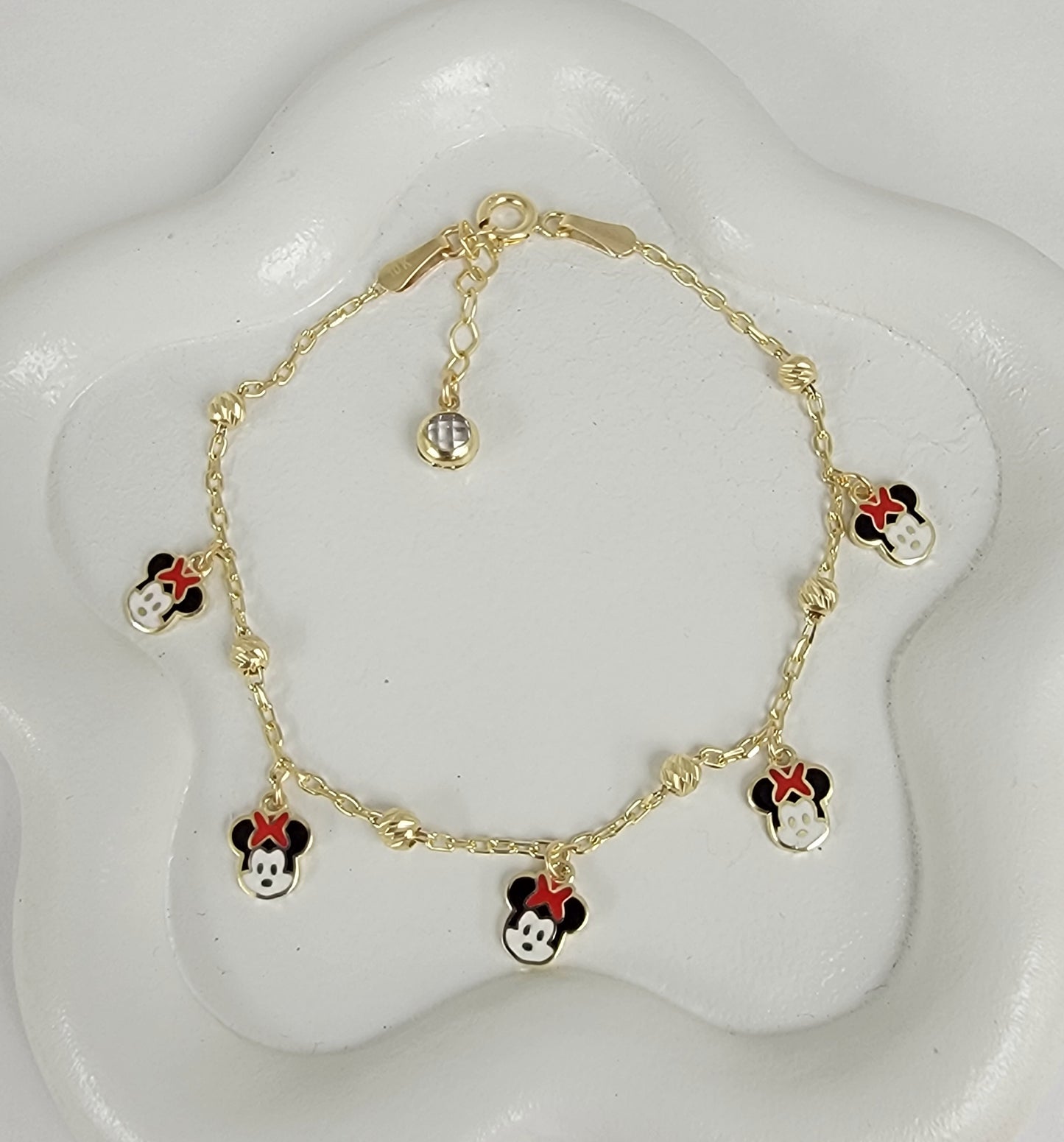Pulsera con colgantes 10k