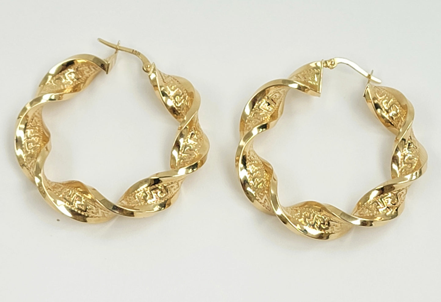 Argollas torcidas versa 14k