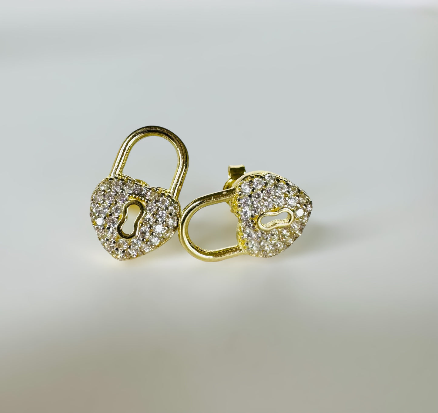 Aretes corazón de candado 14k