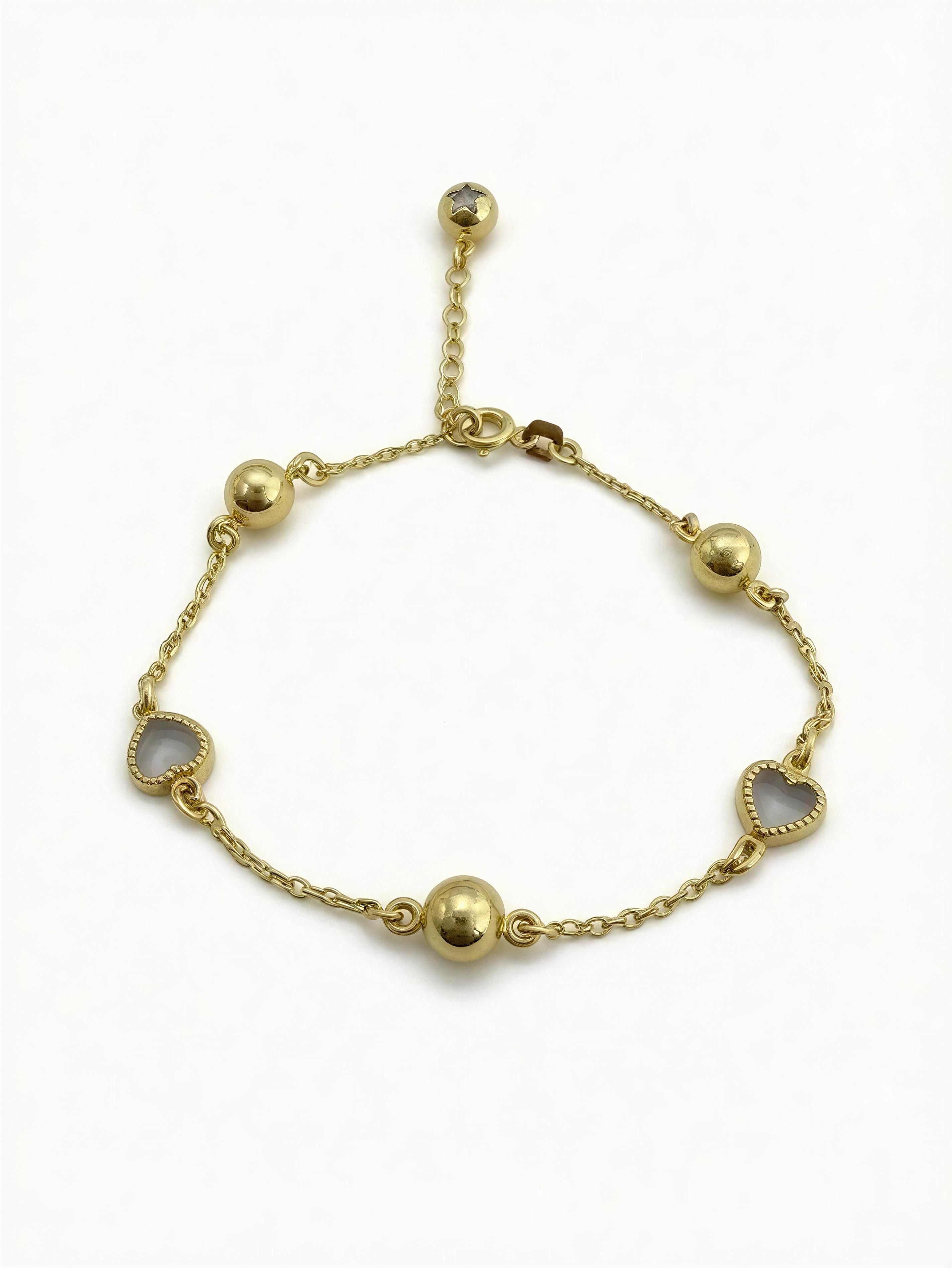 Pulsera balines y corazones 10k
