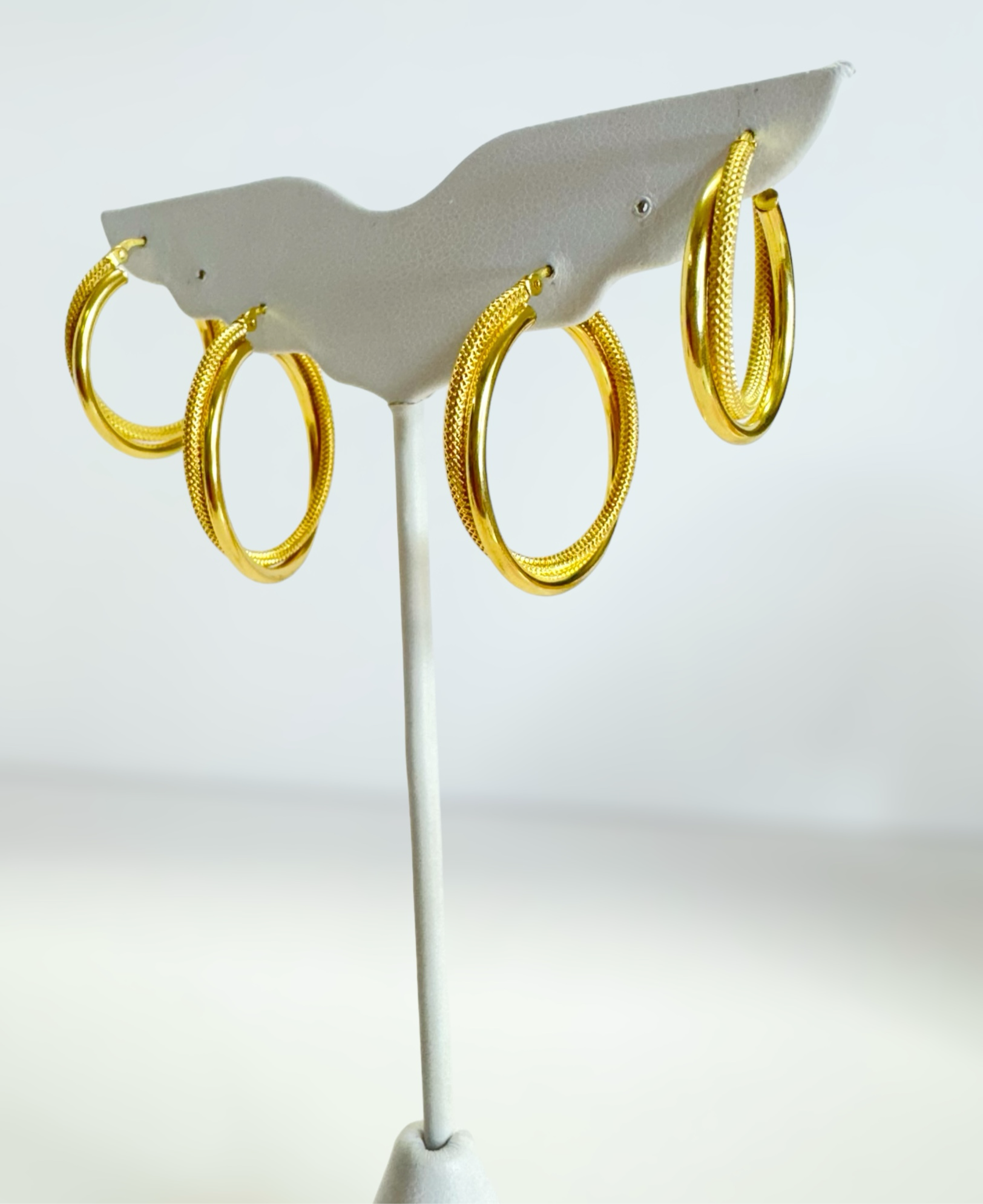 Argollas torcidas combinadas 14k