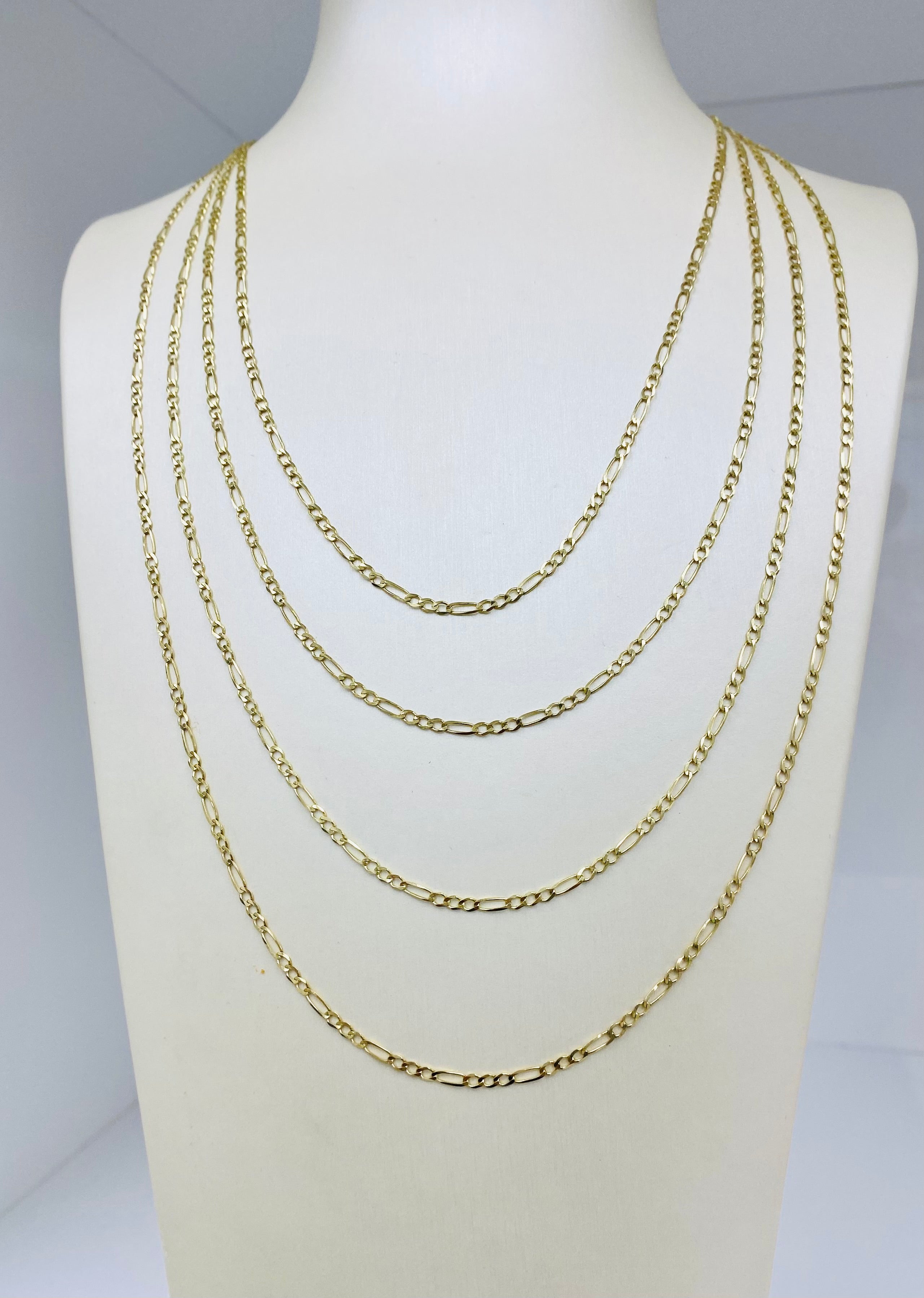 Cadena figaro solida 10 k