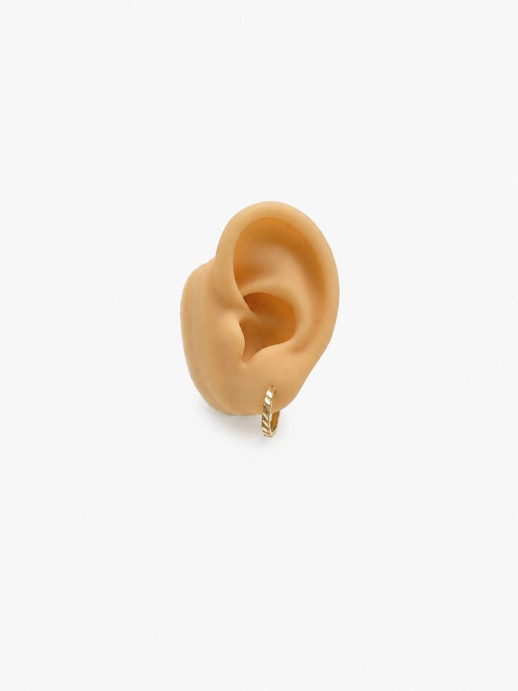 Argollas pequeñas con diseño 10k