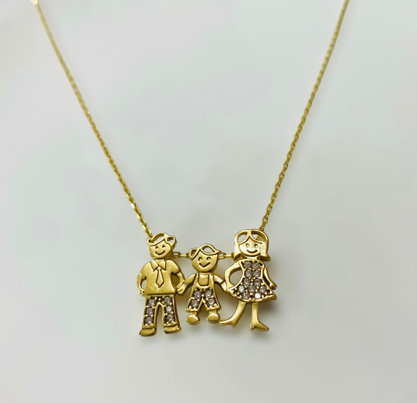 Cadena con dije de familia 14k