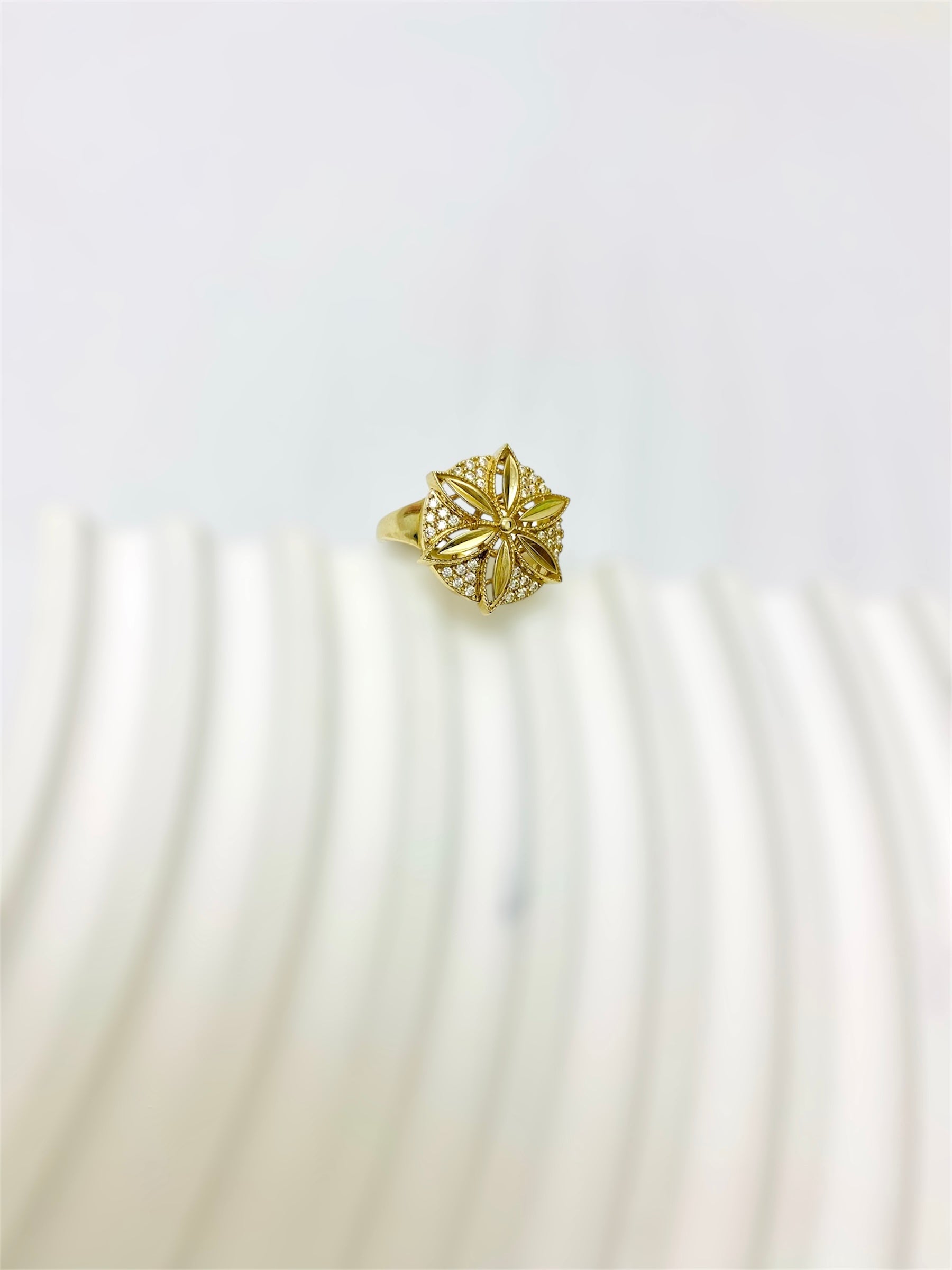 Anillo de flor princesa 10K