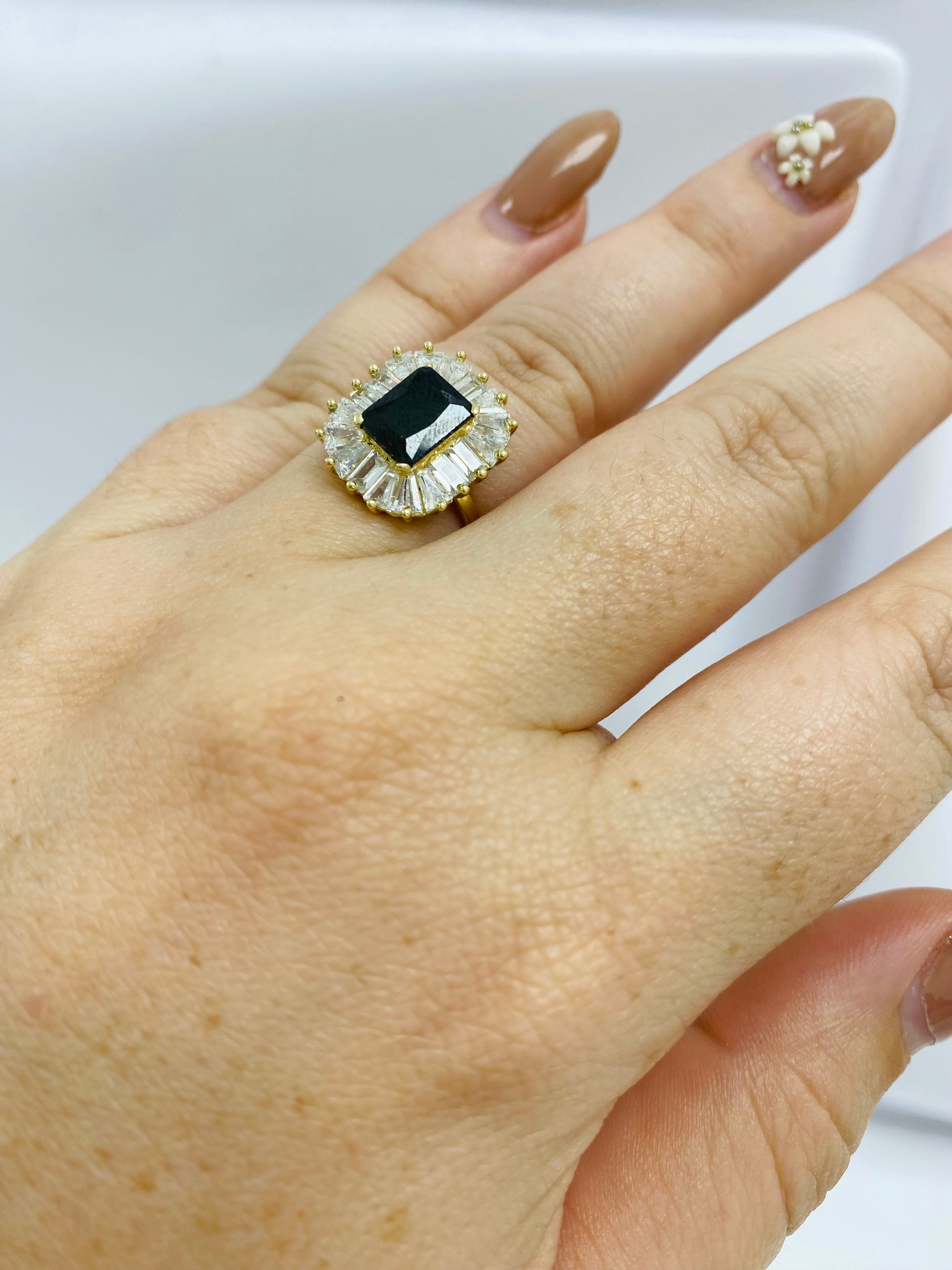 Anillo piedra oscura 10k