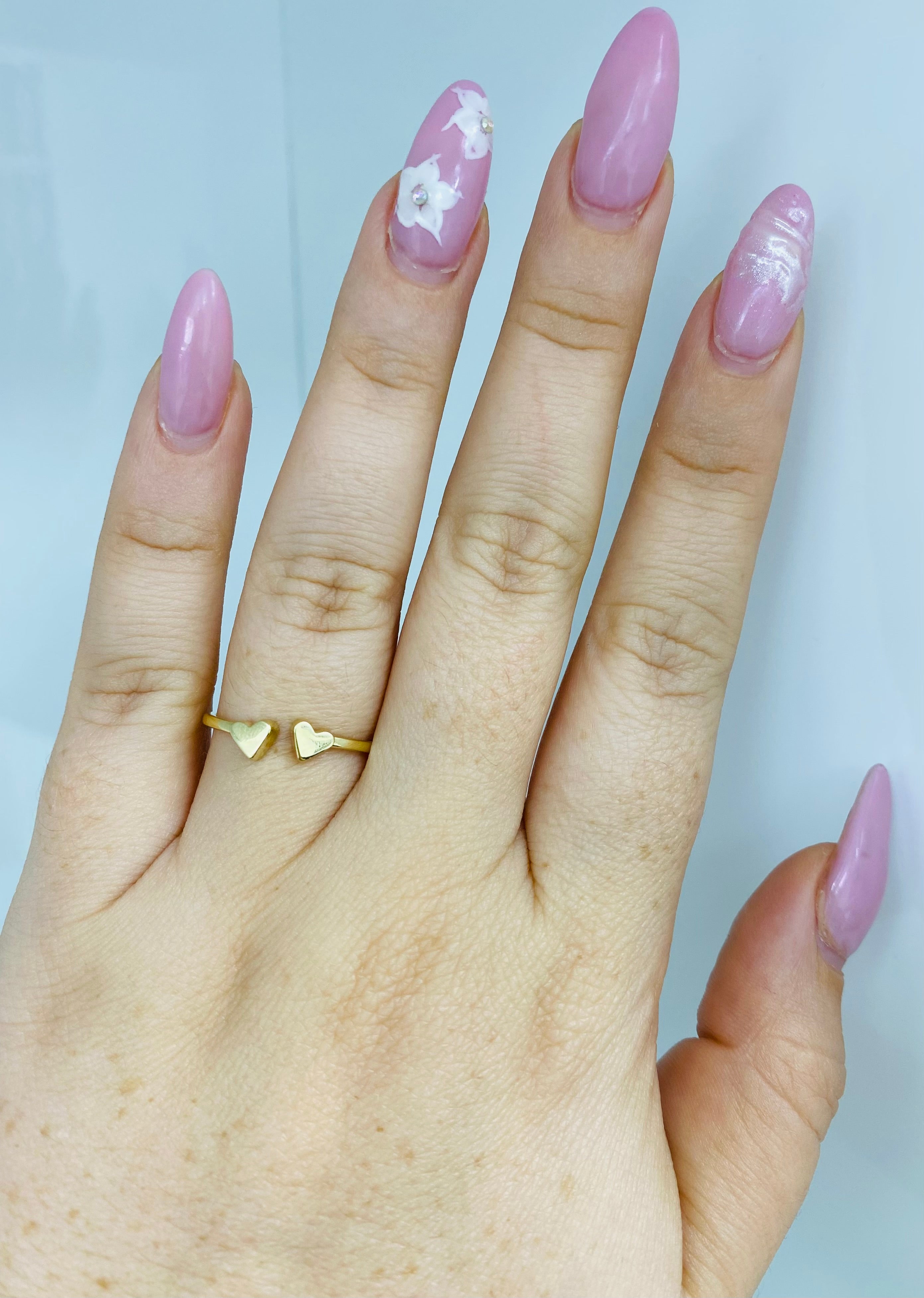 Anillo dos corazones 14k
