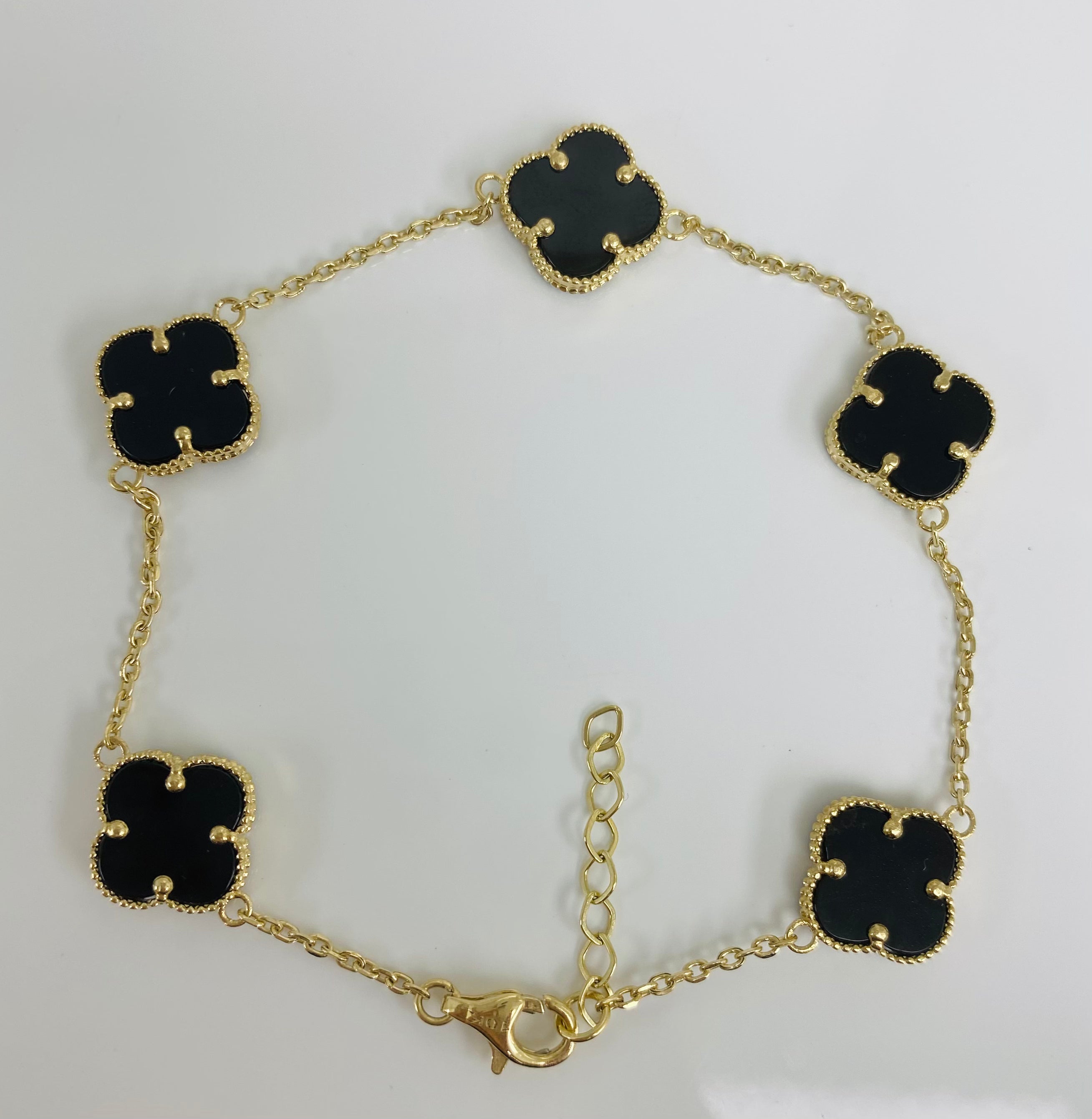 Pulsera 5 clover negra 10k