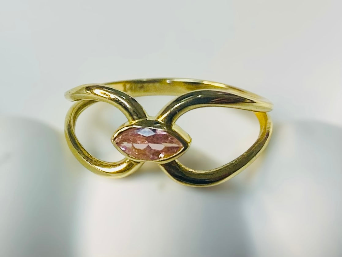 Anillo entrelazado con piedra rosada 14k