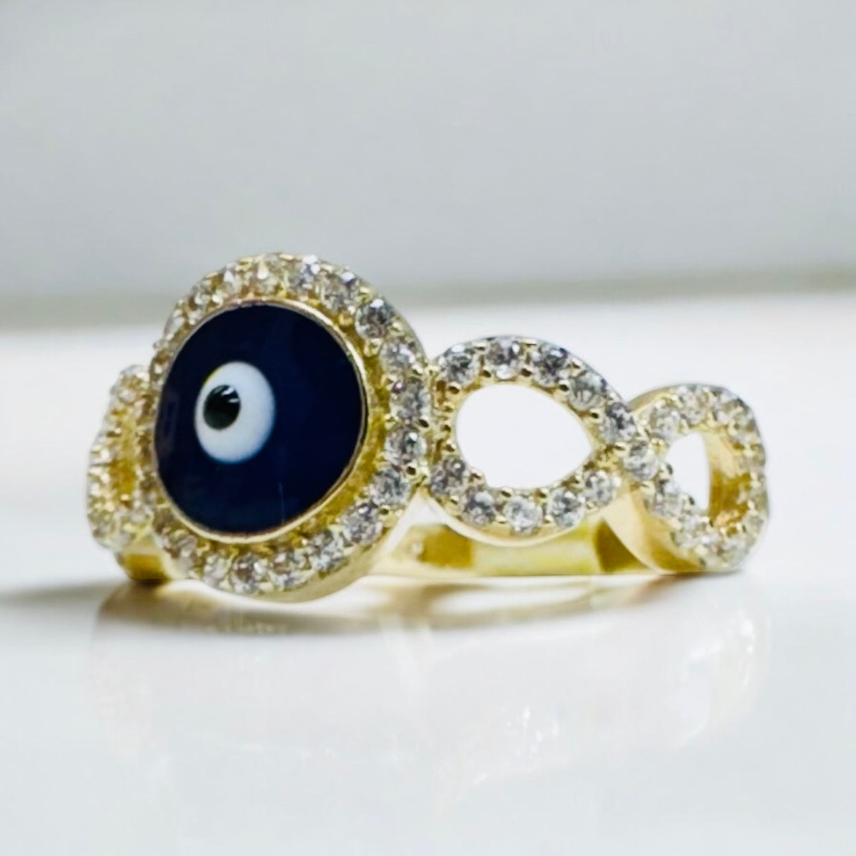 Anillo ojo turco azul con infinito 10k