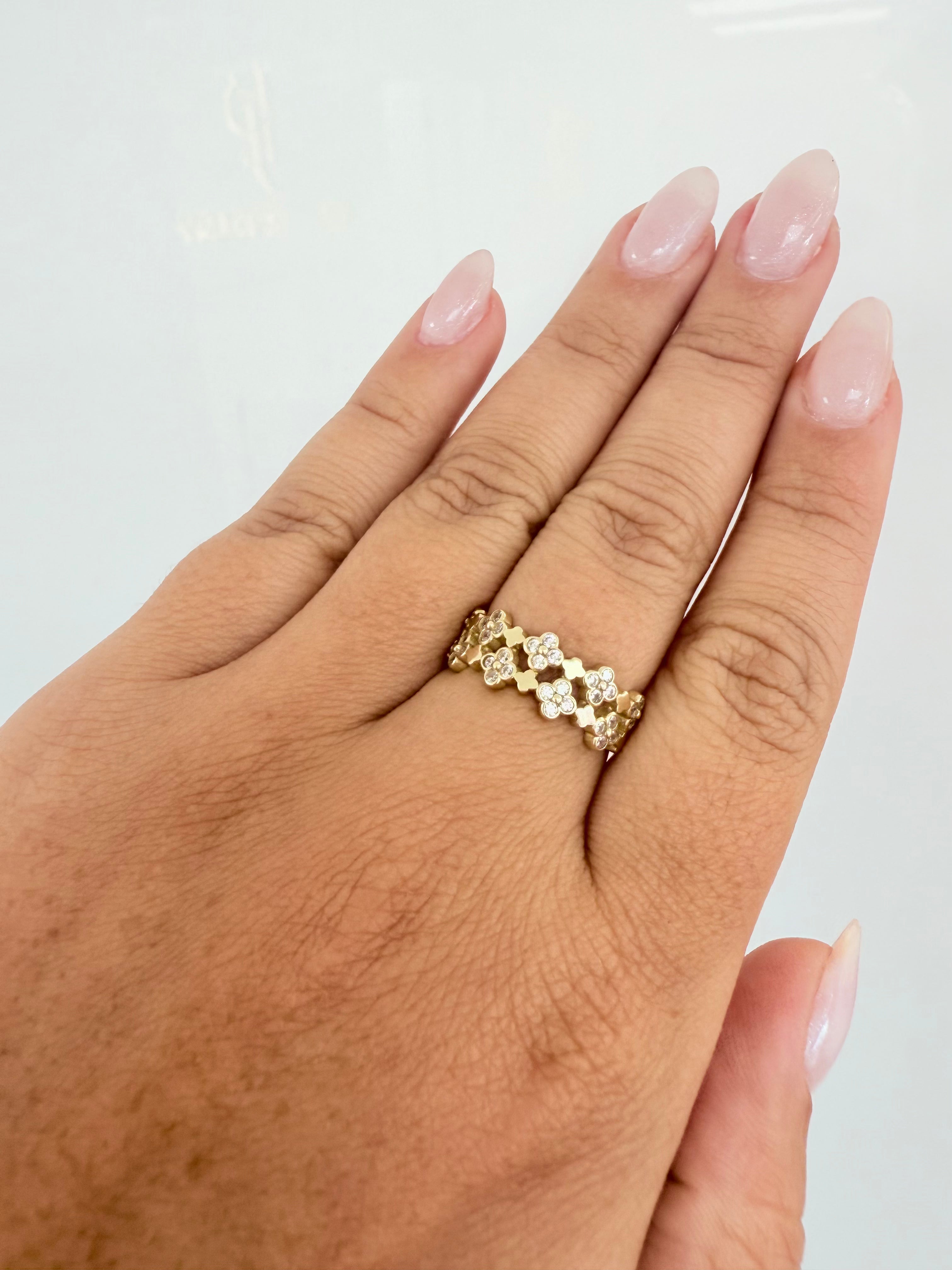 Anillo de doble banda de flor 10k