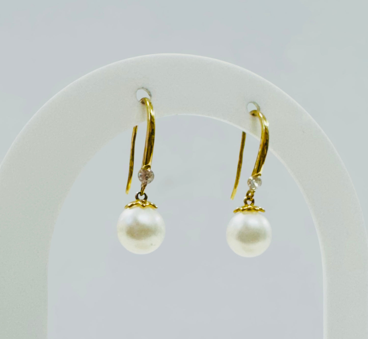 Aretes colgantes con madre perla 14k