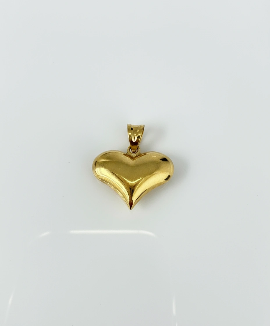 Dije de corazón inflado reversible 14k