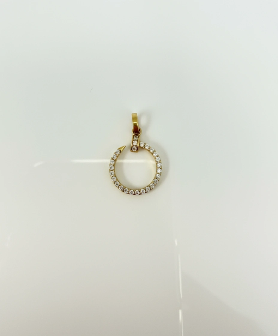 Dije de clavo pequeño 14k