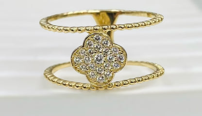 Anillo doble banda con flor en el medio 14k