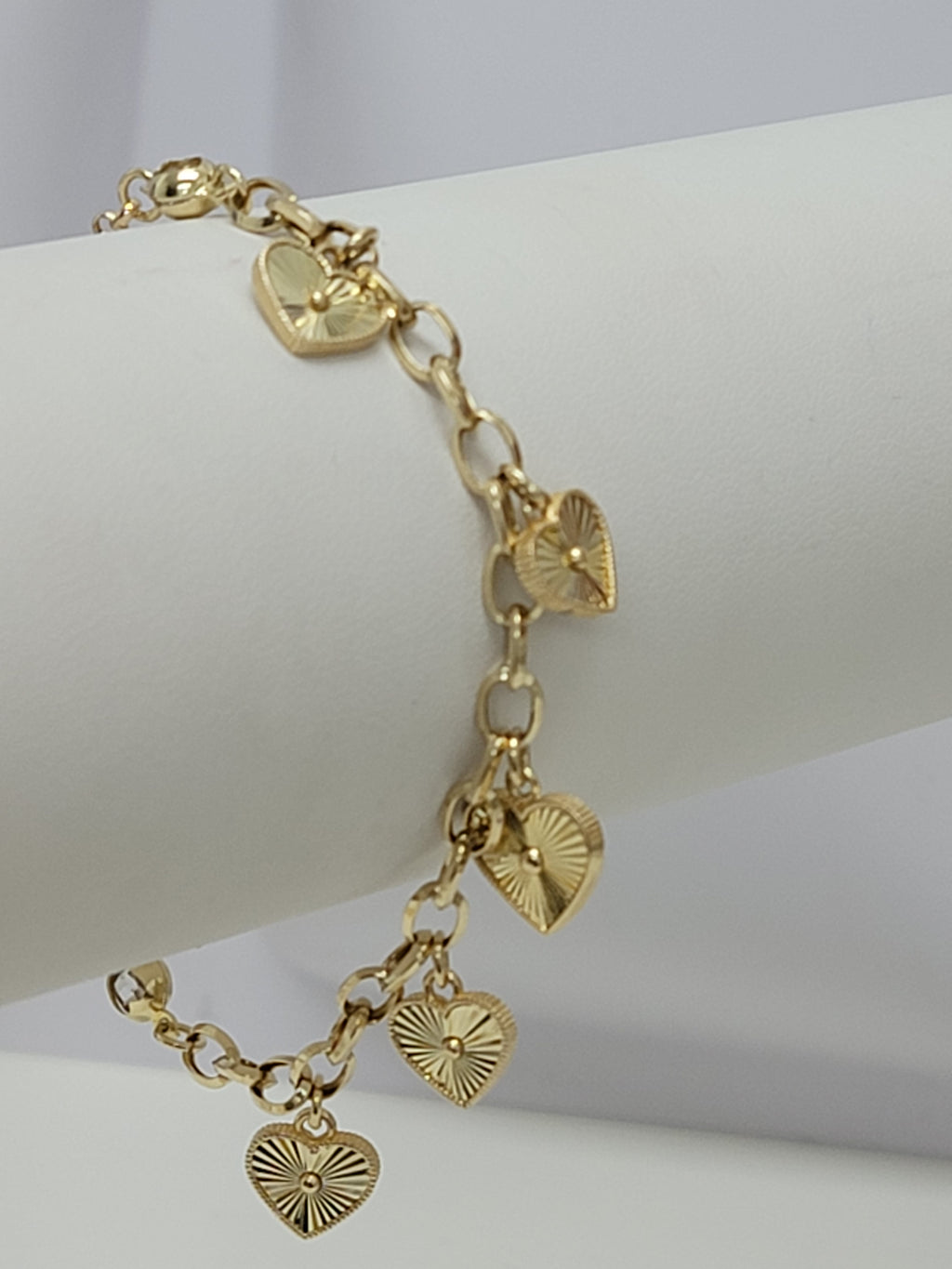 Pulsera corazones colgantes 14k