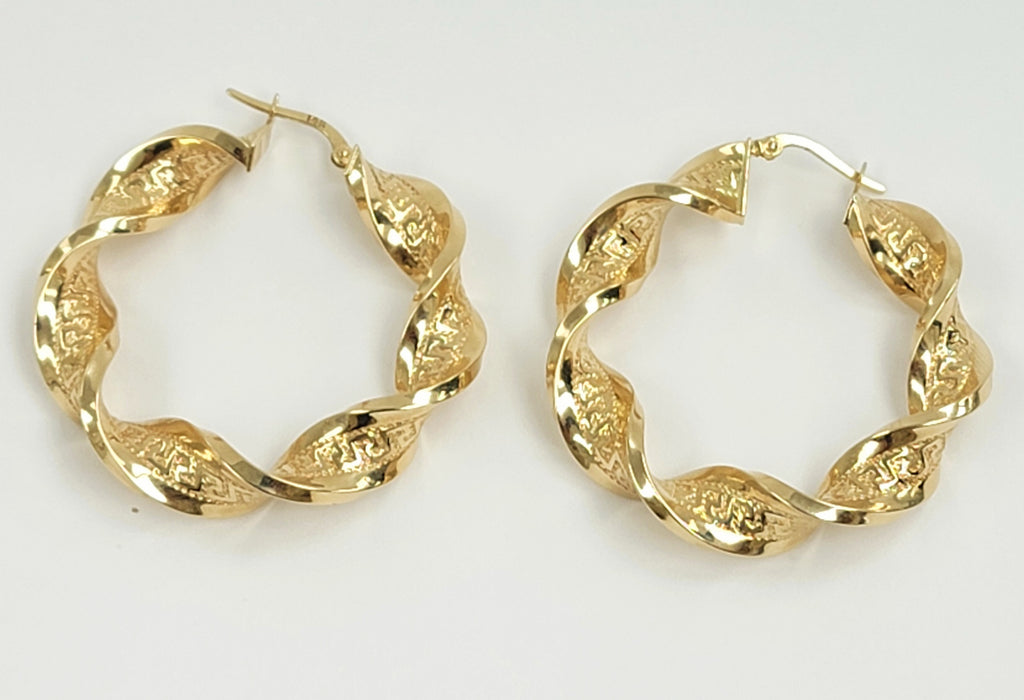 Argollas torcidas versa 14k