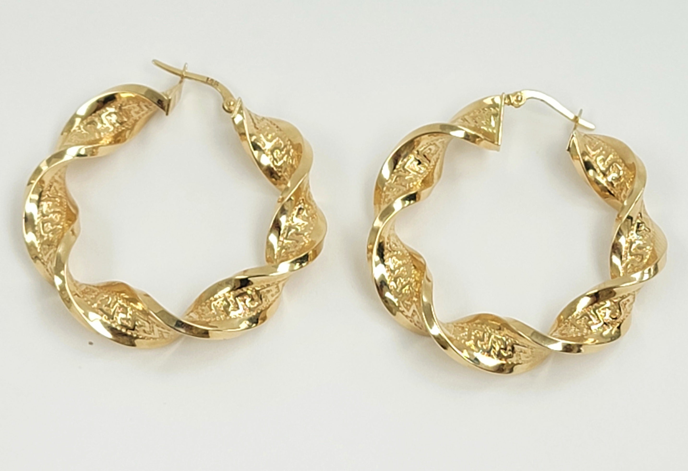 Argollas torcidas versa 14k