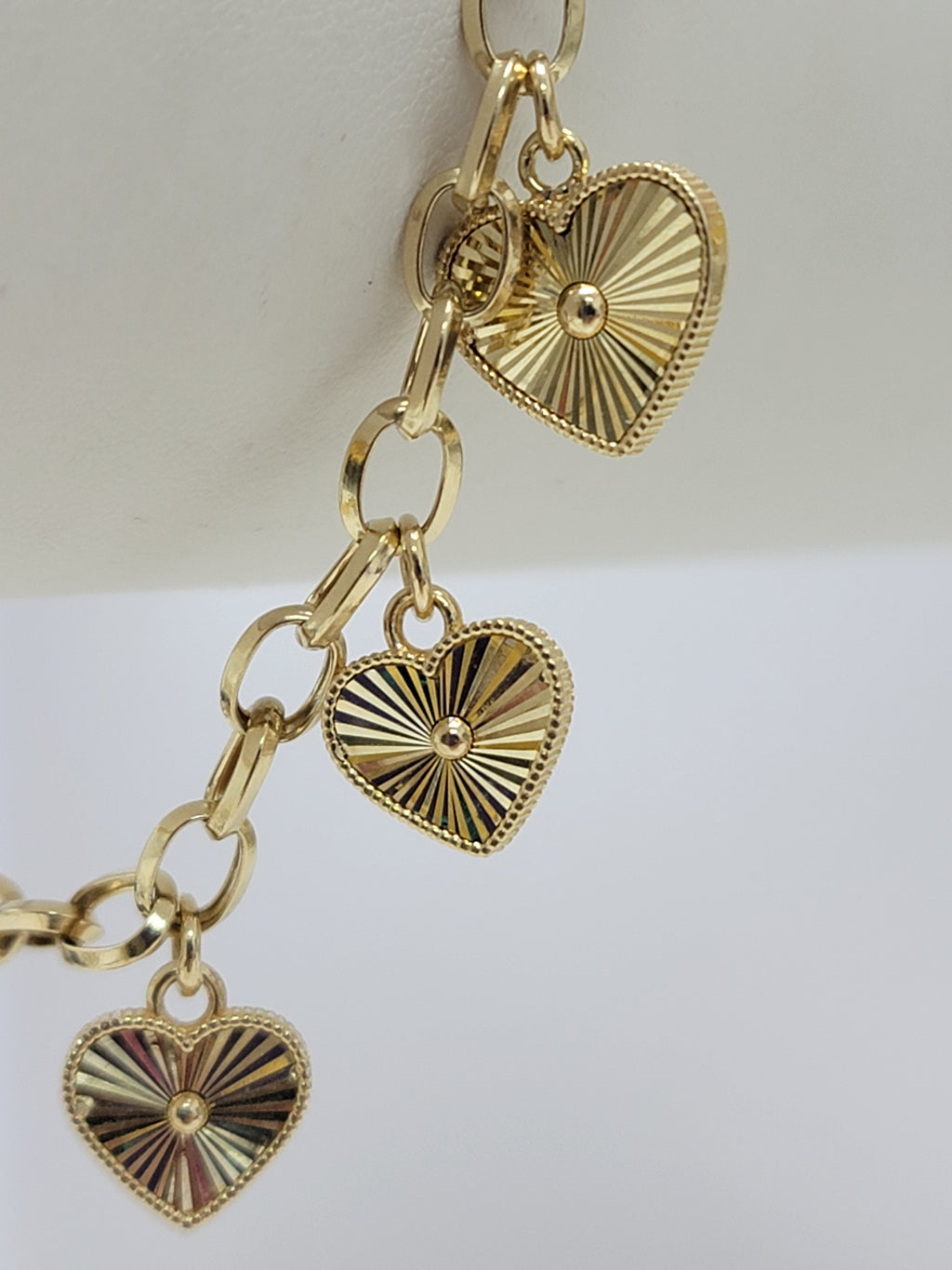 Pulsera corazones colgantes 14k